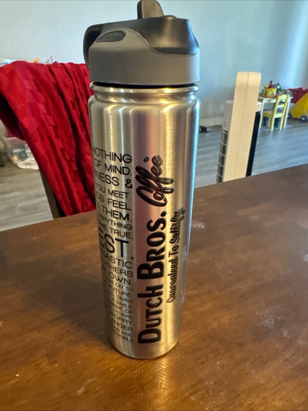 Dutch Bros Stainless Steel Travel Bottle with Black Logo and Gray Lid